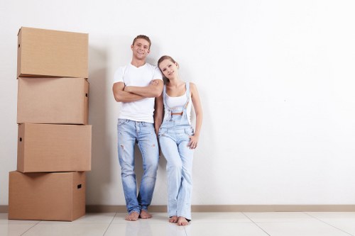 Office removals planning in Aldgate with moving boxes and workspace preparation