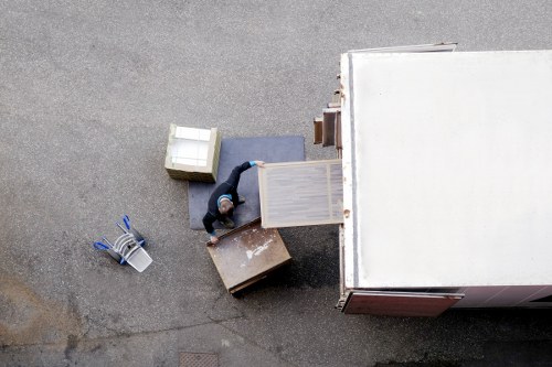 Furniture loading into a van for Aldgate moving service